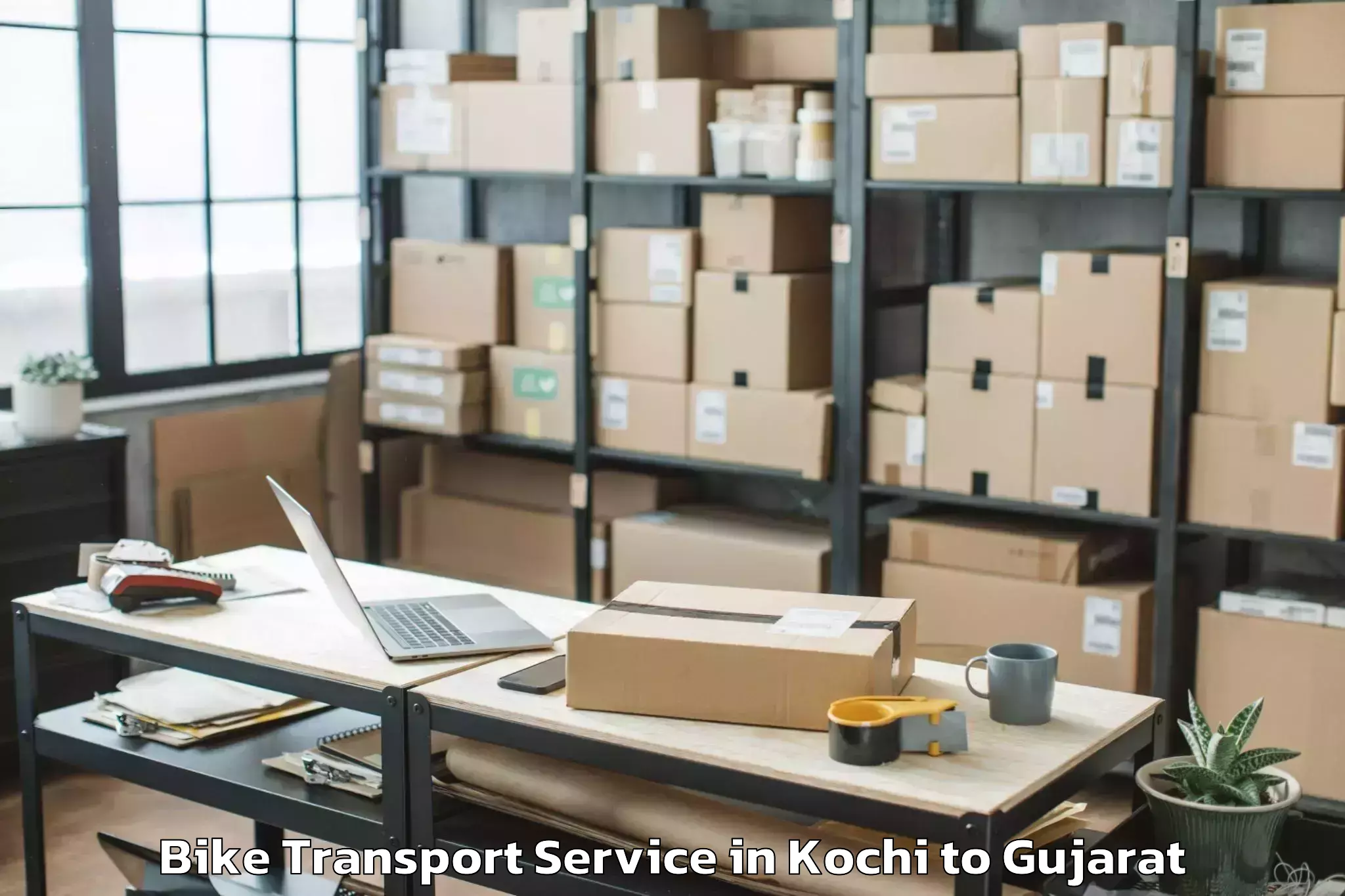 Book Kochi to Gusar Bike Transport Online